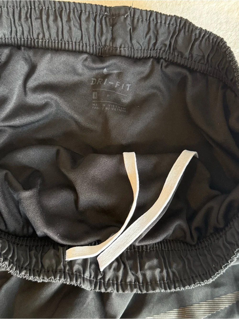 Black Nike running track shorts